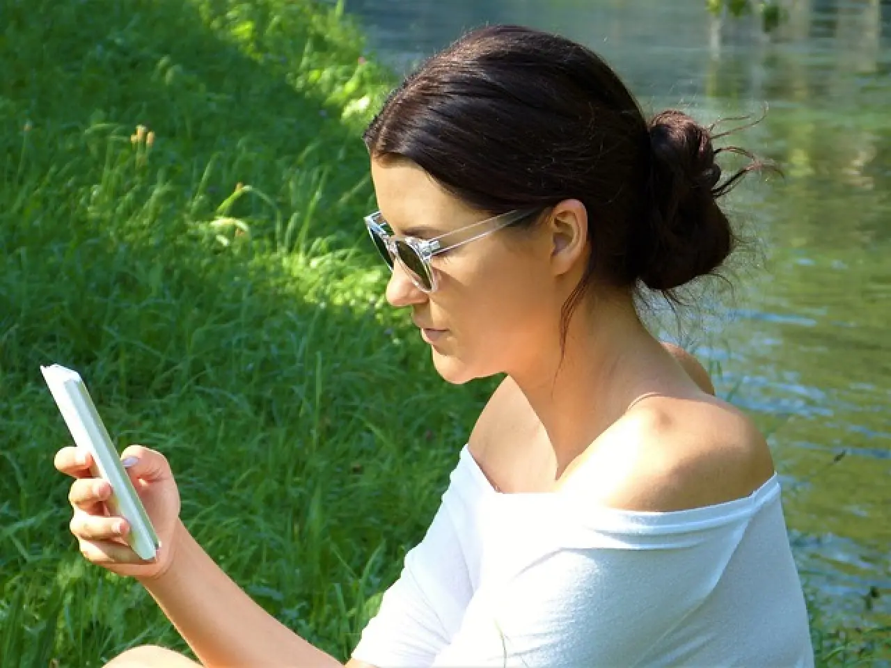 Woman looking at smartphone